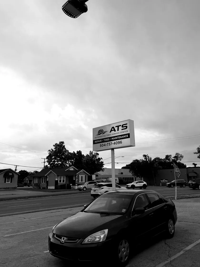 ATS Auto Repair roadside sign on Jefferson Hwy showing phone 504-737-4096